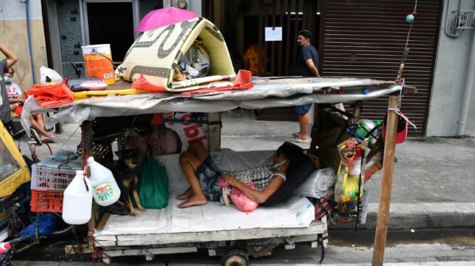 Street life: Manila's homeless find shelter in pushcarts