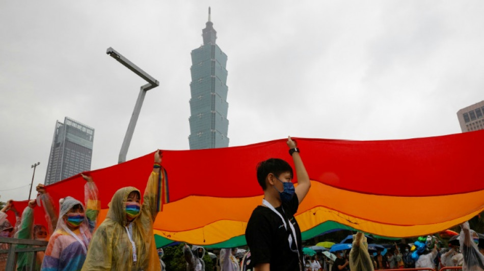 Taiwan expands adoption rights for same-sex couples