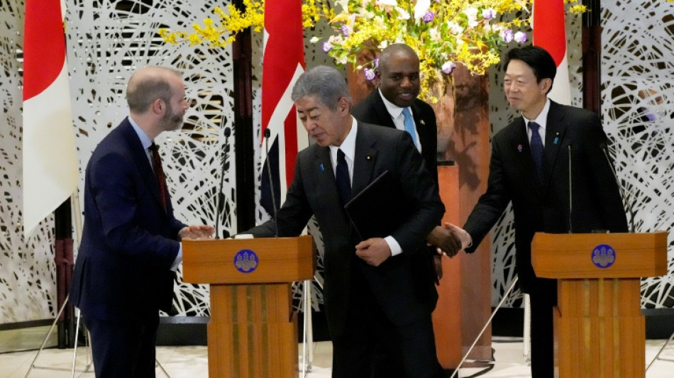 Japan, Britain stress free trade in Tokyo talks