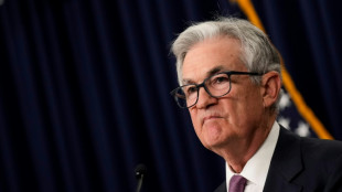 Stocks dip as Powell warns of more rate hikes