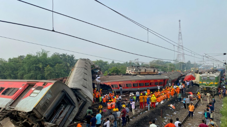 Smashed carriages and corpses: India's train disaster