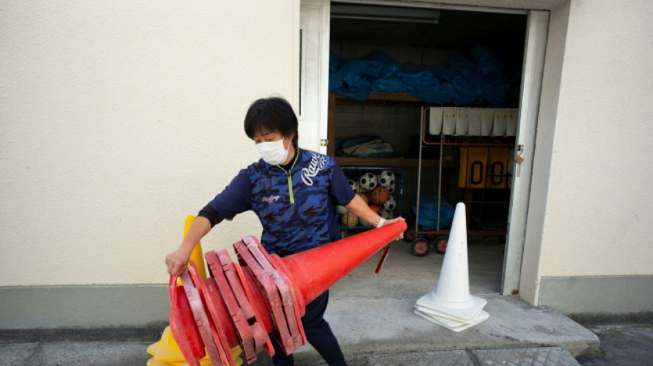 'Work without limits': Japan's teachers battle for change

