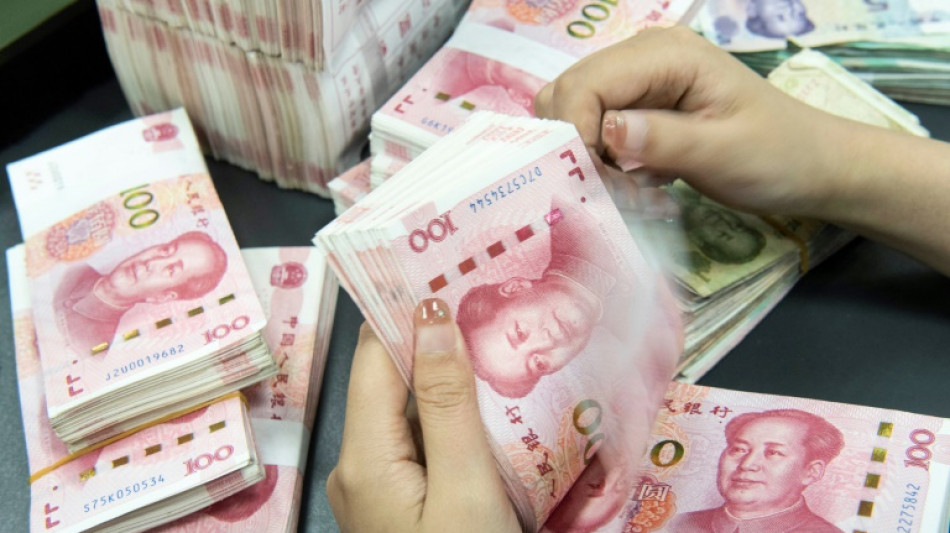 China's central bank cuts two benchmark interest rates 