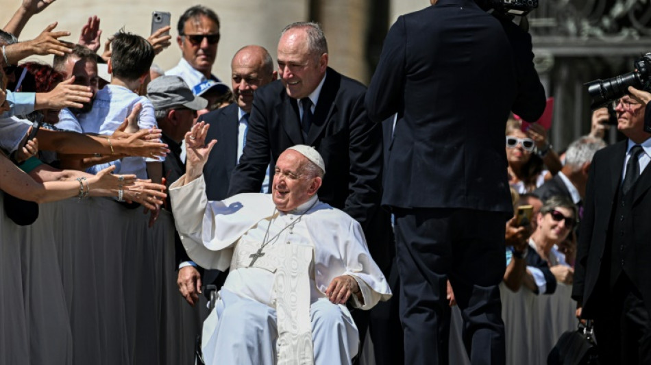 Pope awake and joking after hernia operation