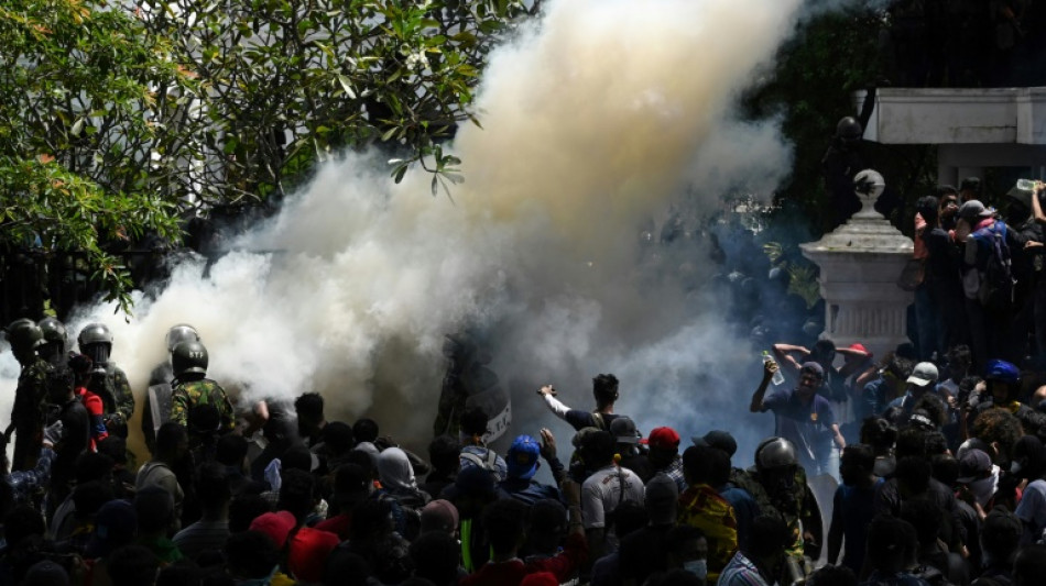 Protesters storm Sri Lanka PM's office after President flees abroad