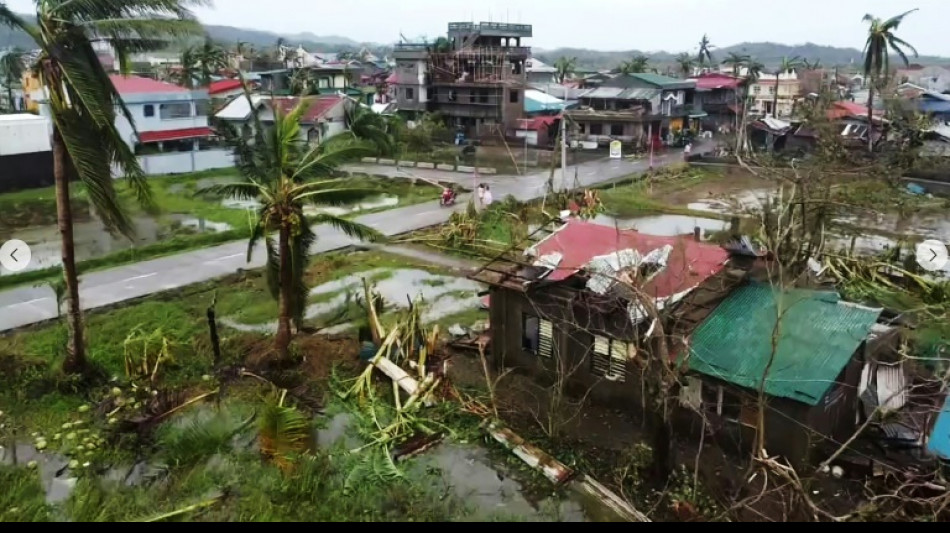 Typhoon Man-yi weakens as it crosses Philippines' main island 