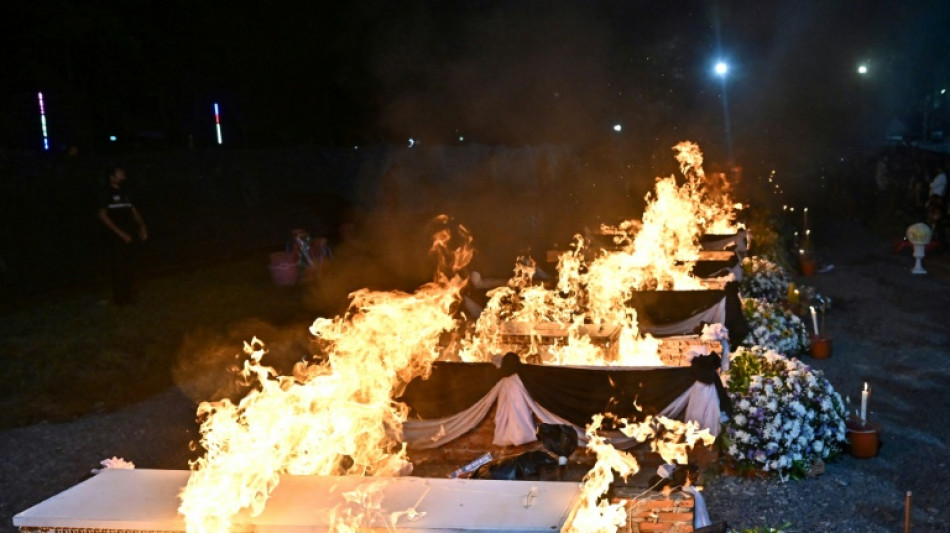 Families gather for cremation of Thai nursery attack victims