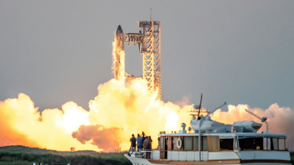 In milestone, SpaceX 'catches' megarocket booster after test flight
