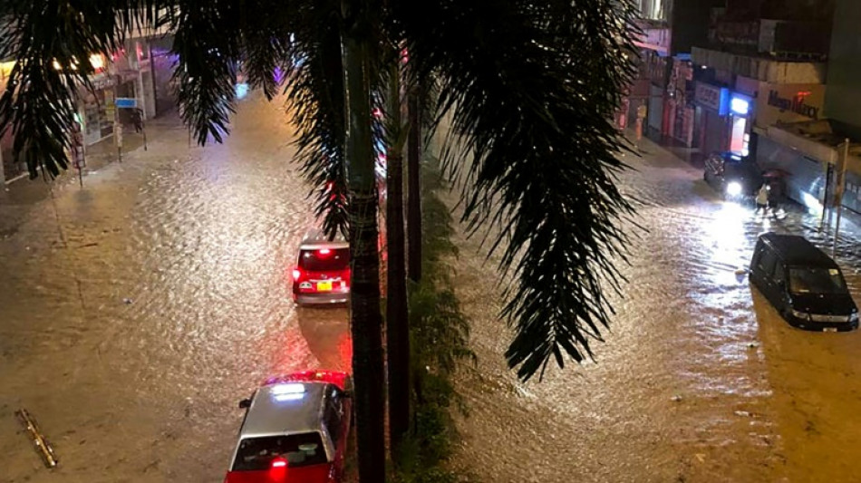 Hong Kong hit with heavy rain, flooding days after typhoon