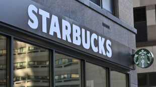 Starbucks profits fall but points to progress in turnaround