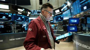 Wall Street termine en hausse, encouragée par Powell et Microsoft