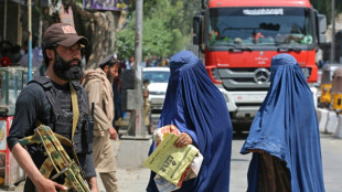 Afghan supreme leader says women 'saved from oppression' by Taliban