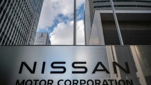 Nissan keeps annual profit forecasts, cuts unit sales target