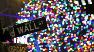 US stocks end rocky week lower ahead of holiday