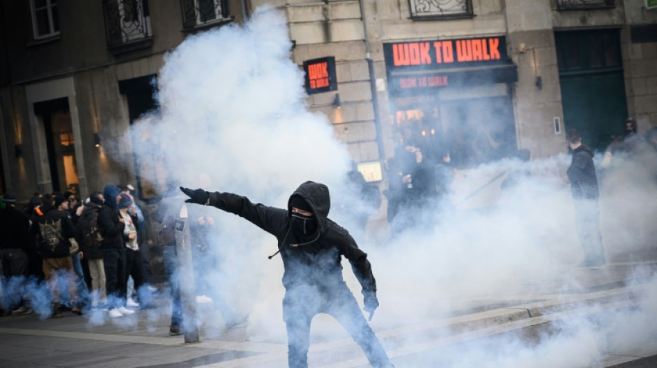 French protest over Macron forcing through pension reform