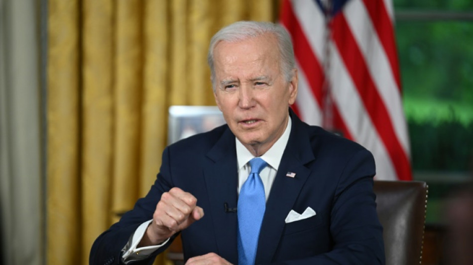 Biden hails averting 'catastrophic' default in Oval Office speech